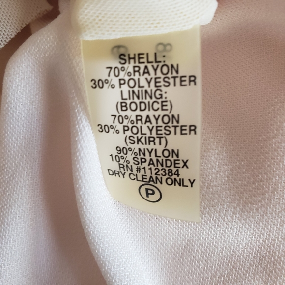 New Floor Length Sleeveless Calvin Klein Gown - Picture 12 of 12